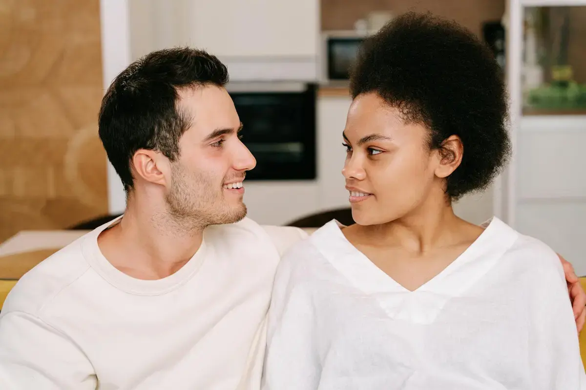 Words Explaining Love: relaxed couple sitting together for safe love
